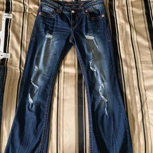 Size 30 dark denim distressed jeans